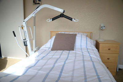 Electric profiling bed in disabled holiday accommodation