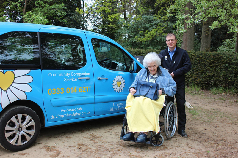 Driving Miss Daisy disabled-friendly car and passenger in a wheelchair