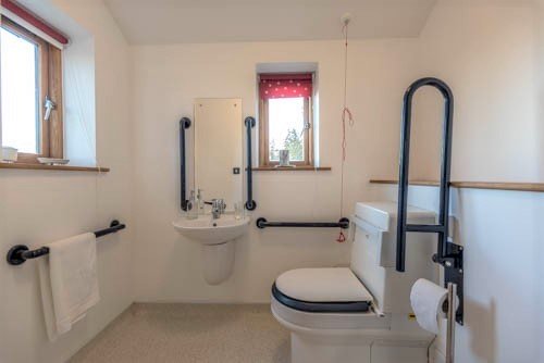 Accessible bathroom with Closomat shower toilet in Herefordshire